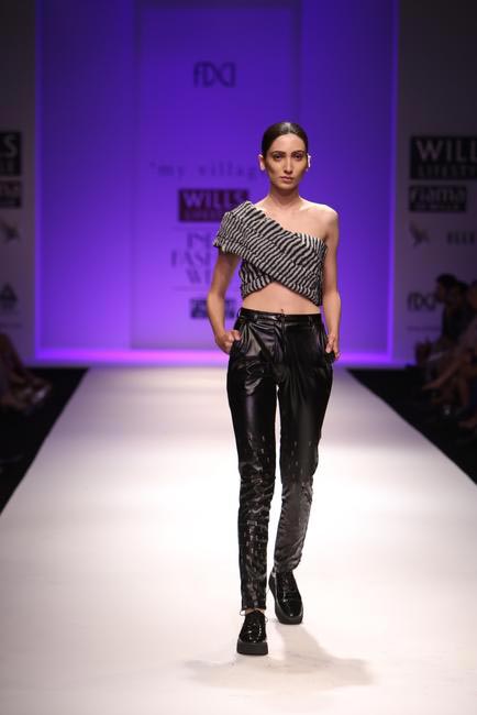 Faux Leather Pants with Arrow cutouts and knotted silicon top by Rimzim Dadu