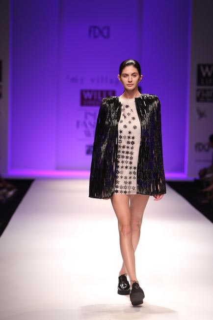 Monochrome compass dress with looped leather jacket by Rimzim Dadu
