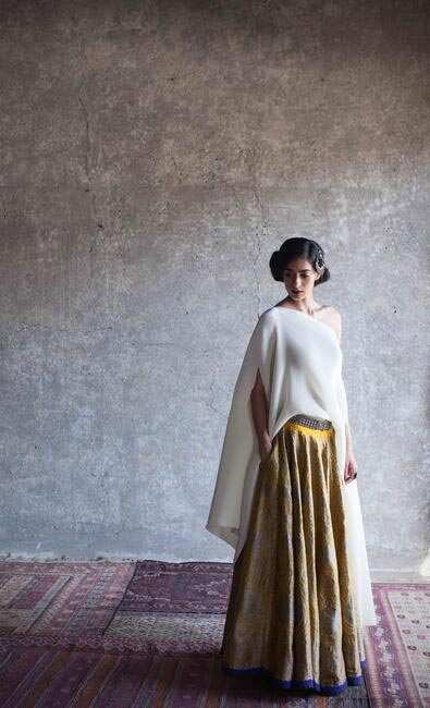 Look 12 | Handwoven Silk Brocade Lehenga Satin Pleated Backless Poncho  Handfinished Brass Earrings The … | Indian fashion dresses, Indian fashion,  Fashion dresses