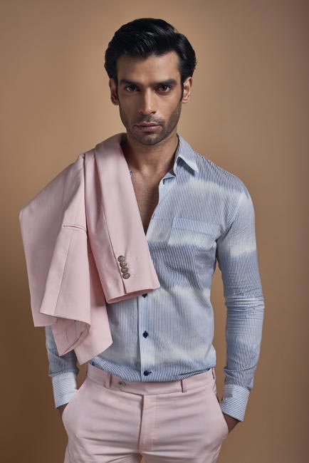Gaurav Arora; striped shirt, Lecoanet Hemant; double breasted jacket and trousers, both Pratham & Gyanesh