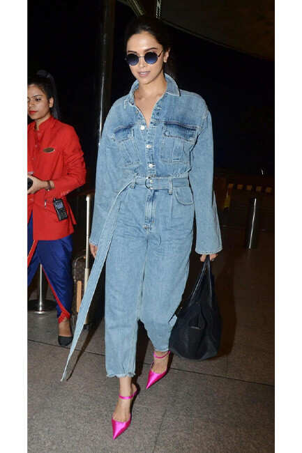 MissMaliniFashionApproved: @sonamkapoor papped at the airport in a chic  brown dress paired with long coat and boots! 🤎 She never fails to … |  Instagram