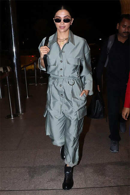 Deepika Padukone makes a stylish appearance in long camouflage jacket at  airport