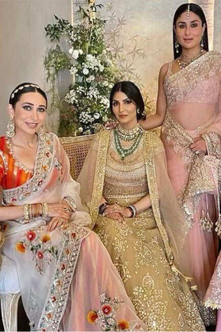 Karisma Kapoor transforms into a modern bride in white chikankari lehenga  and bold red lips | Fashion Trends - Hindustan Times