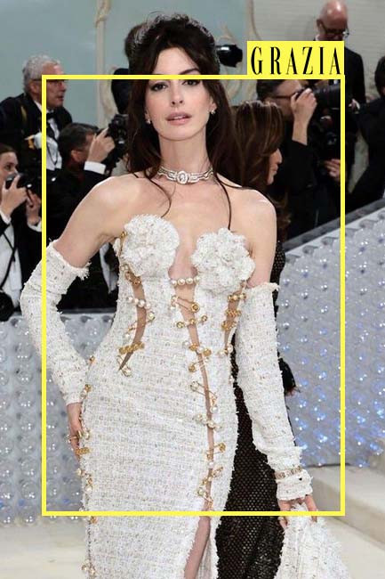 Anne Hathaway Gave the Tweed Dress a Sexy Edge on the 2023 Met Gala Red  Carpet